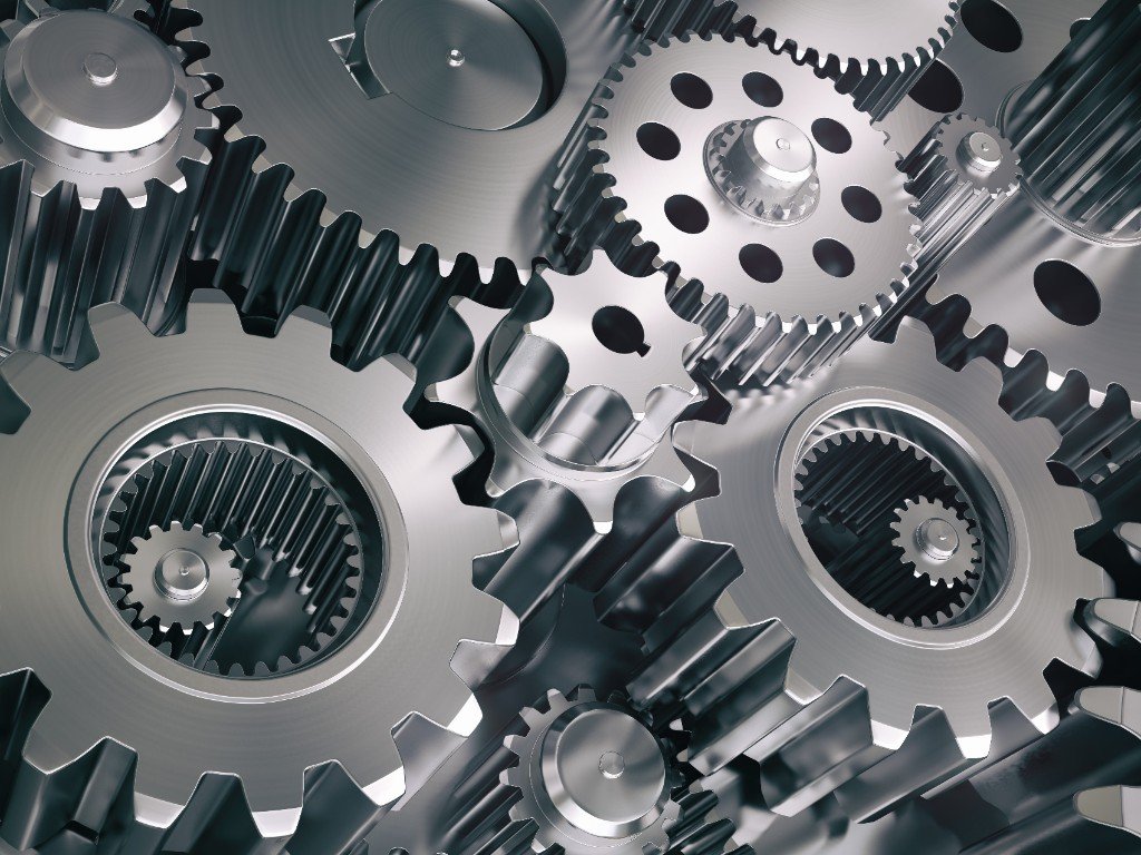 Close-up of interlocking industrial gear assembly showing precision mesh